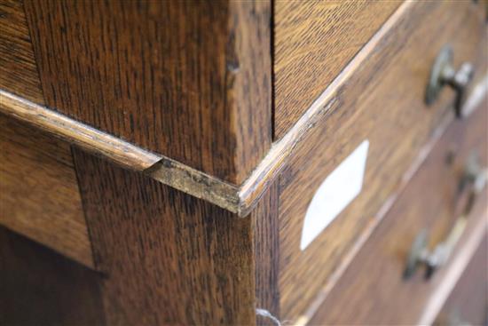 An Edwardian oak pedestal desk W.153cm